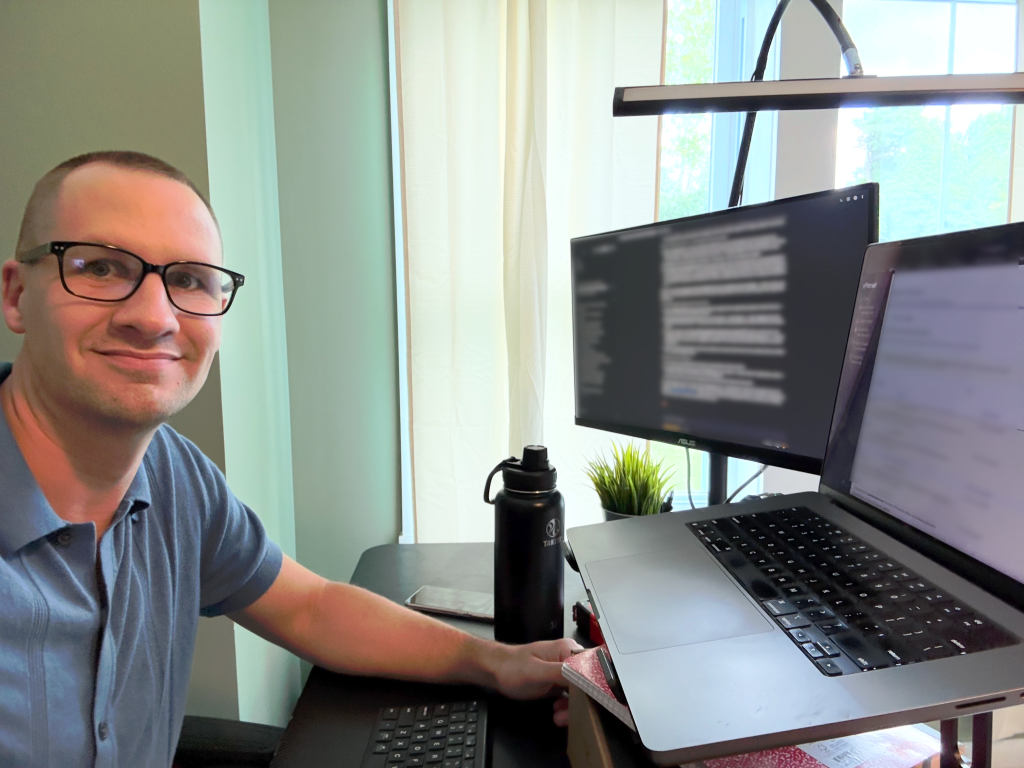 Ethan McNeil working on computer stuff