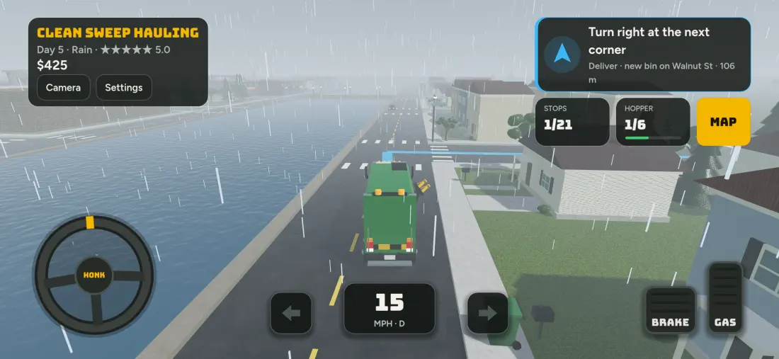 The garbage truck driving through town in the rain